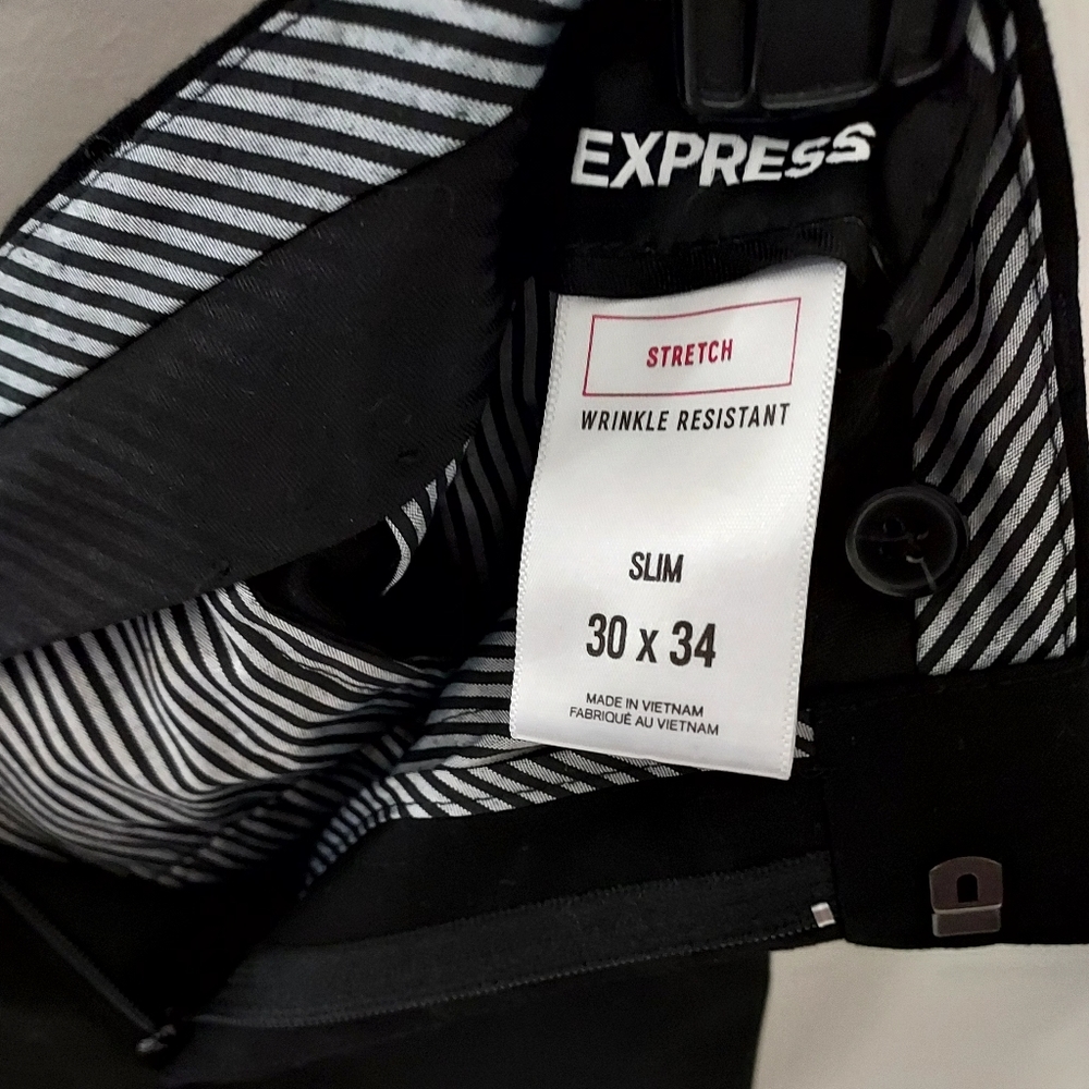 Mens Express dress pants.  69% Polyester, 29% Rayon, 2% Spandex